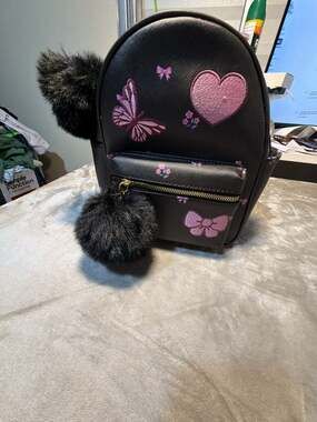 Under One Sky Black Decorative Mini Backpack with Pom Pom